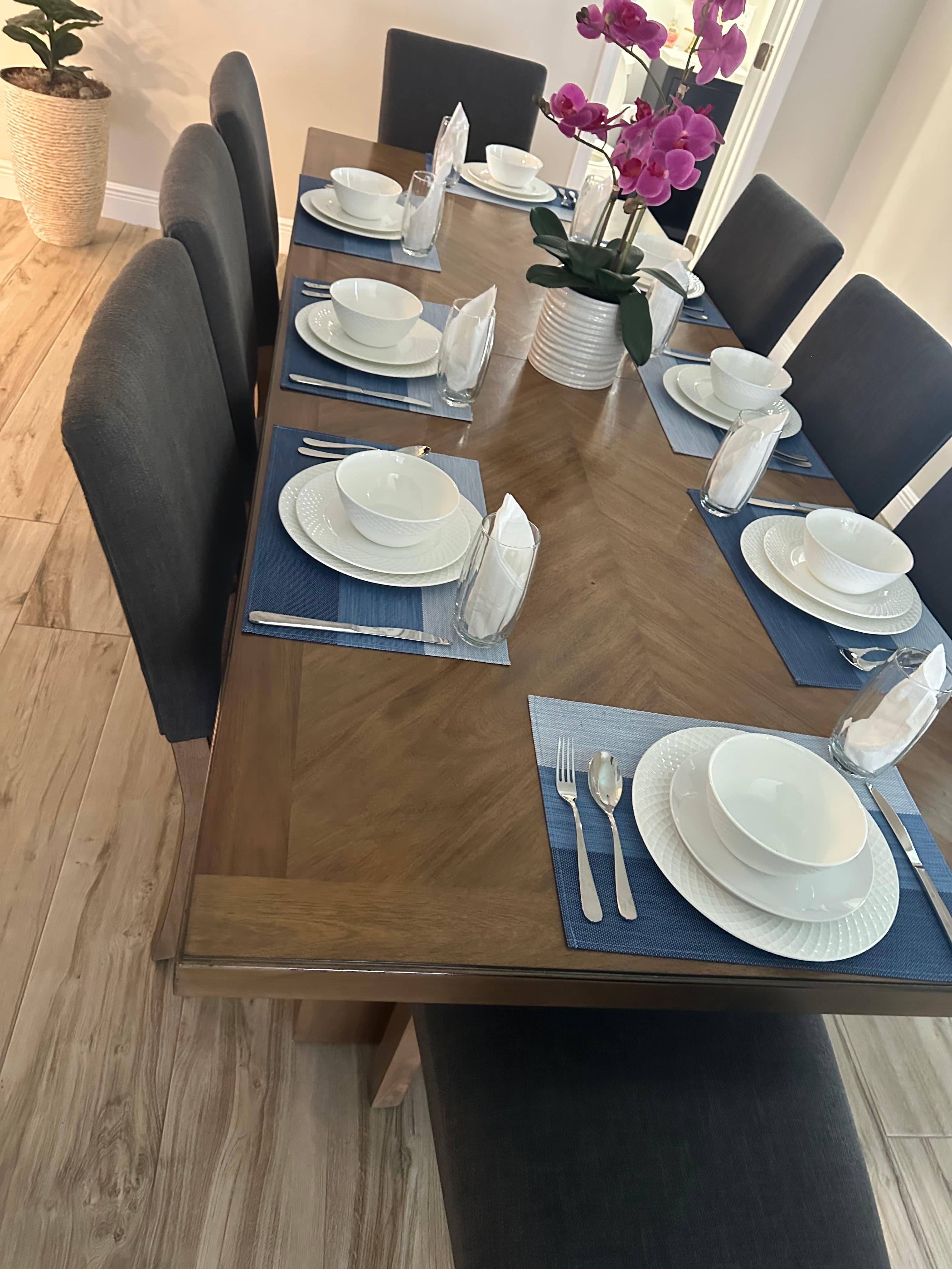 Beautifully set dining table after cleaning